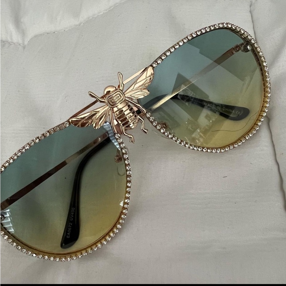 Green and gold frame glasses